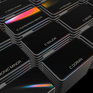 A stack of scale folders labeled to show that all scales are organized in the key of C.